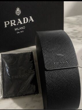 Prada Black Textured Saffiano Eyeglass Case with Logo with Prada lens wiper.
